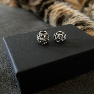 Charm spacer. They fit the Pandora bracelet.